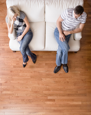 Young Couple Sitting on Love Seat (Demo)
