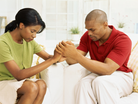 Couple trusting God in prayer (Demo)