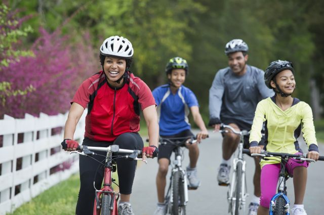 Family riding bicycles together (Demo)