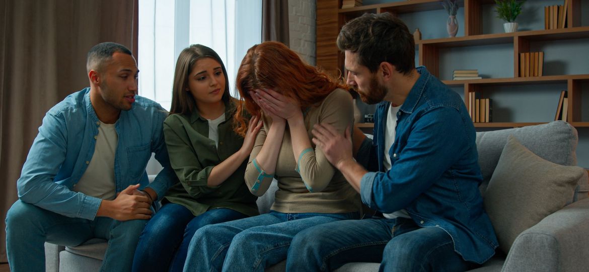 Friends comforting friends