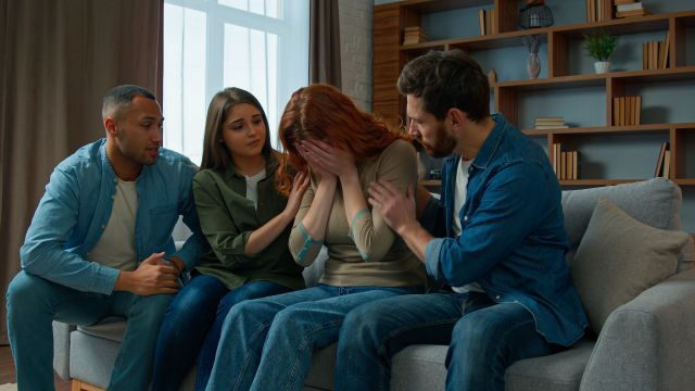 Friends comforting friends